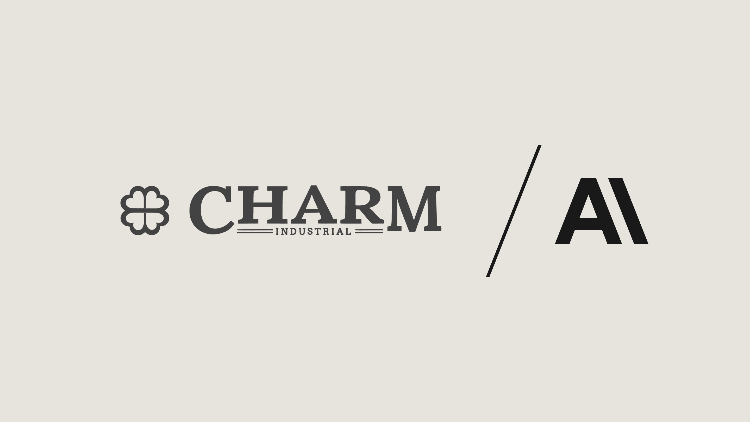 Charm and Anthropic Logos